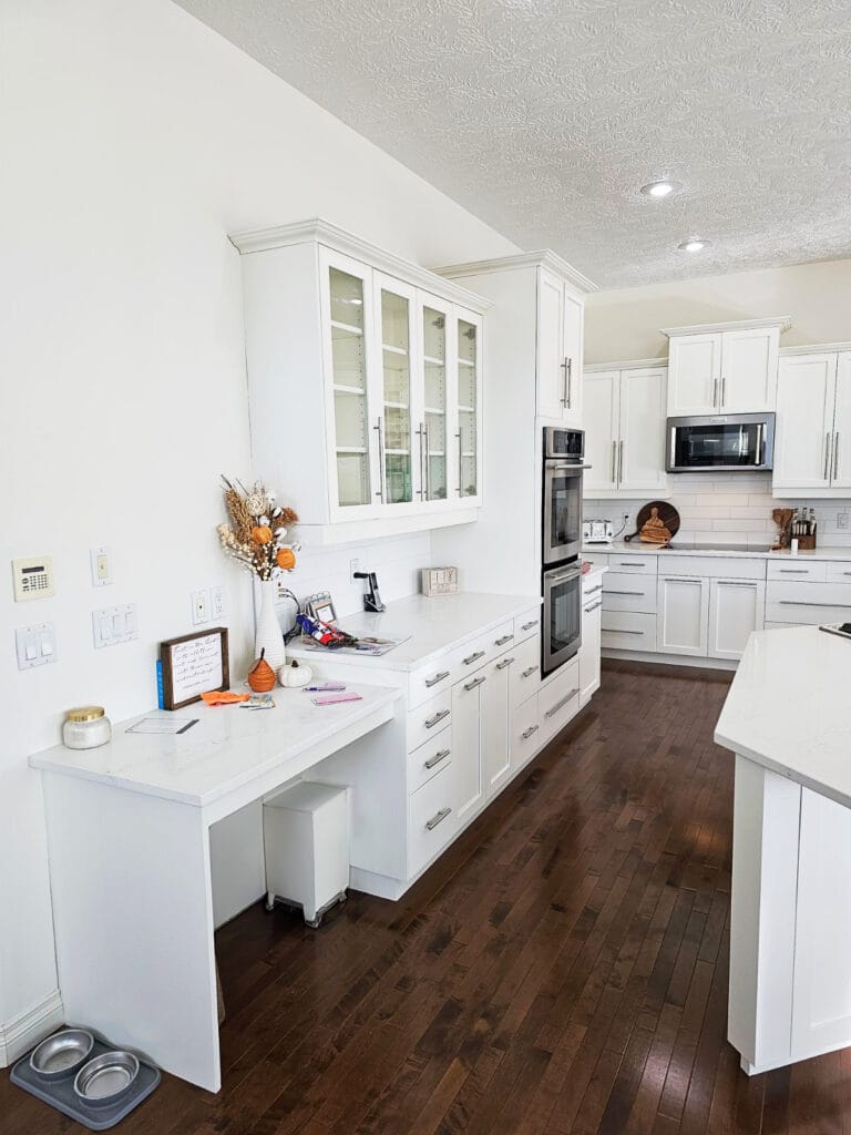 Refinished white kitchen cabinets in a Sherwood Park home